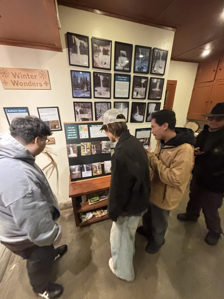 Friends browsing a small shop